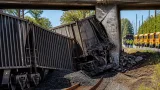 Coal train derailment near Eureka damages bridge support, shuts roadway and disrupts Amtrak service