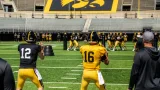 Iowa football’s fall camp opens with quarterback duel and unsettled defensive line