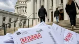 Judge bars Wisconsin voters from voiding returned absentee ballots in Democratic primary
