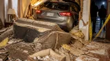 Lubbock woman hospitalized after vehicle plows into home; dog missing, squatters reported