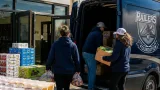 Worcester Railers deliver $2,500 in food to South Worcester Neighborhood Center