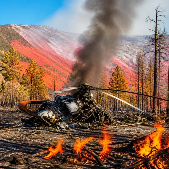 Two pilots killed when firefighting helicopter crashes as Utah blaze expands